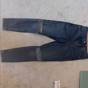 Pair of jeans with 2 slits in the knee